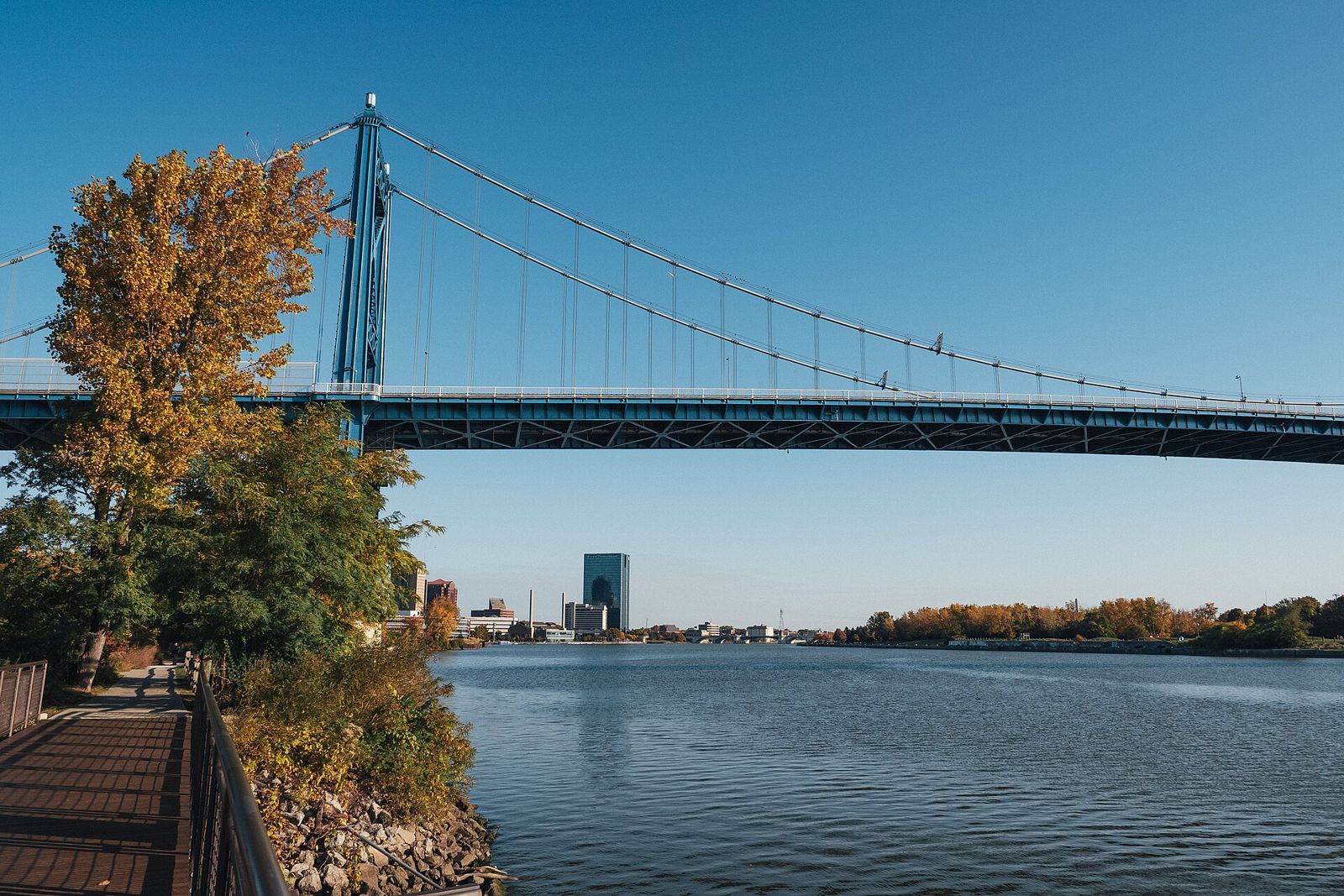 Anthony Wayne Bridge over the Maumee River with the Toledo skyline, seen from Middlegrounds Metropark